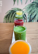 PHOTO BY RYAN WILLIAMSON - Above: a five-juice flight at Just Juice