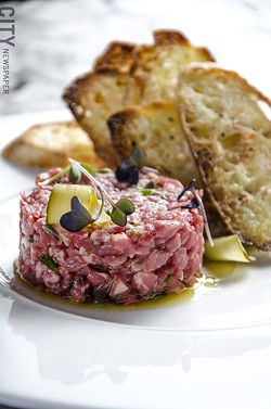 Wagyu beef tartare with toasted crostini. - PHOTO BY MARK CHAMBERLIN