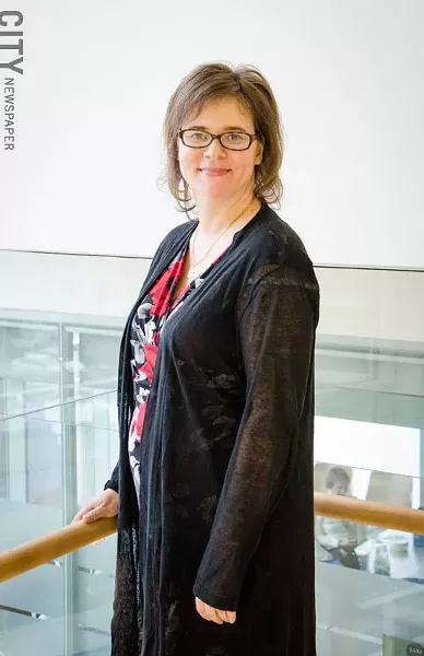 We need to do a better job promoting mental wellness, not just treating illness, says Ann Marie White, URMC assistant professor in psychiatry. - PHOTO BY MARK CHAMBERLIN