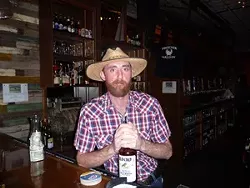 Bartender Chris Hooker at the Phoenix Saloon