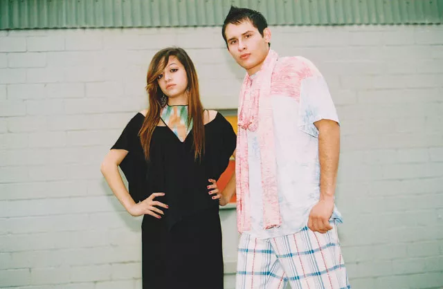 Candace Guzman and Marcus Moncada in Ferreira Designs by Adrienne Yunger. - BRYAN RINDFUSS