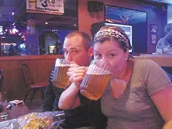 Dr. Ellington and Dr. Adams demonstrate the awesomeness of Rascals’ $3.50 mini pitchers.