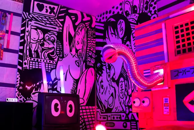 One room at Fox Motel was tranformed into a hentai-themed playroom, complete with a wall-mounted sex toy. - ANDREW LOPEZ