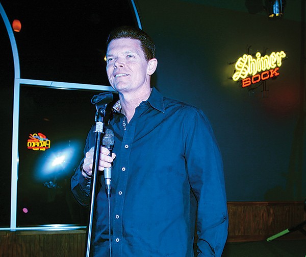Owner Rick Rice at the karaoke mic - ESSENTIALS210
