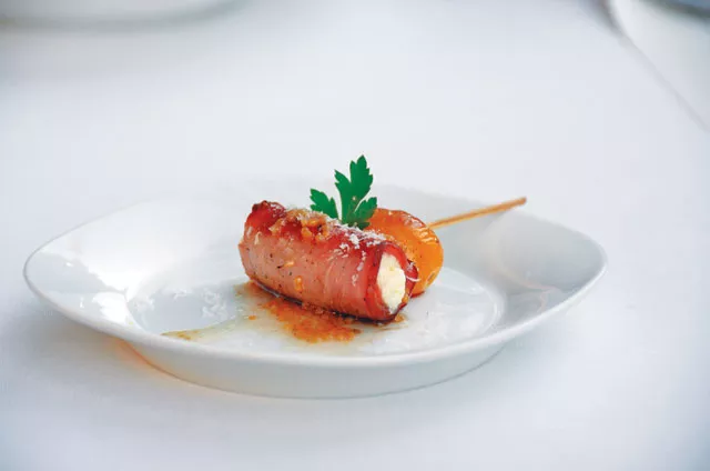 Ricotta in puff paste amuse-bouche. - SCOTT ANDREWS