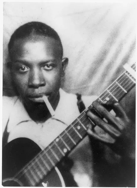 Robert Johnson in the early ’30s, in one of the only two verified photographs of him. - COURTESY PHOTO