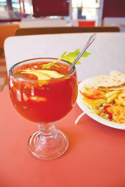 Shrimp cocktail and shrimp quesadilla from Taqueria Vallarta. - VERONICA LUNA