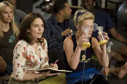 Tina Fey plays the straight woman to Amy Poehler’s ... eye-breast-pumping woman.