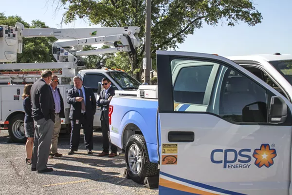 City and CPS officials get a look at one of the utility's new Plug-In F-150s.