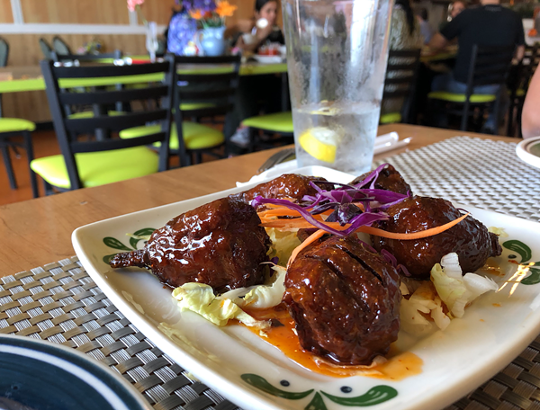 Sweet chili chicken wings from Thai Vegan on Huebner Road. - JESSICA ELIZARRARAS