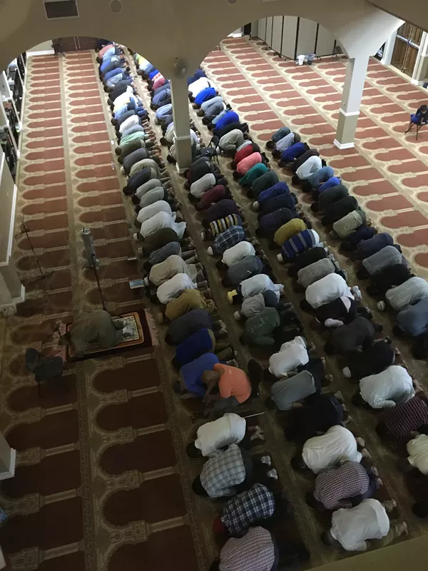 Muslims at the MCECC joined for prayer before and after they broke fast on Thursday, the last day of Ramadan. - MEGAN RODRIGUEZ
