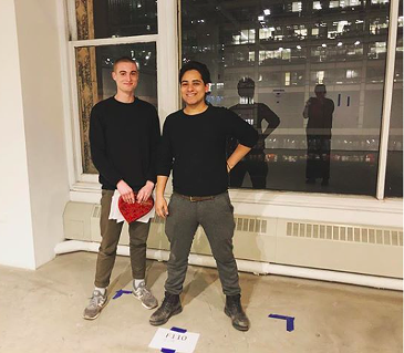 Cárdenas (right) prepares for an exhibition in Chicago. - VIA CÁRDENAS' WEBSITE