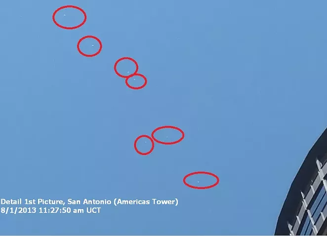 This image purports to show several unexplained flying objects sighted above San Antonio's Tower of the Americas. - VIA URBAN 15