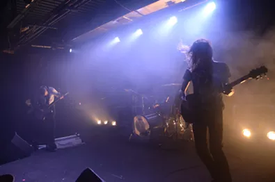 Russian Circles guitarist Mike Sullivan lets the hair fly. - CHRIS CONDE