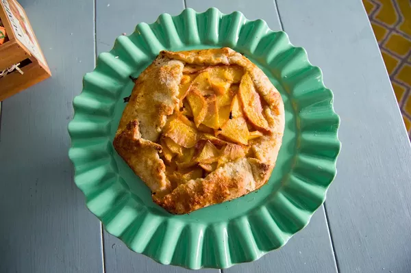 Annie Vu, owner of Annie’s Petite Treats, sources fresh and local fruit like apricots for her seasonal cookies, pies and galettes. - LEA THOMPSON