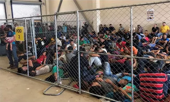 Families huddle together in an overcrowded cell at the Border Patrol’s station in McAllen. - DEPARTMENT OF HOMELAND SECURITY OFFICE OF THE INSPECTOR GENERAL