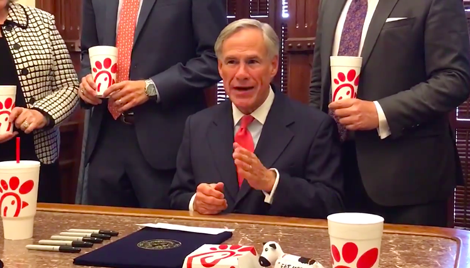 Gov. Greg Abbott makes a point about religious freedom with Chick-fil-A cups carefully arranged in the shot. - TWITTER / @GREGABBOTT_TX