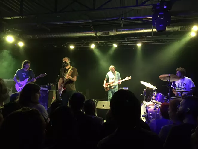 Doug Martsch and crew plough through a number at the Paper Tiger. - MIKE MCMAHAN