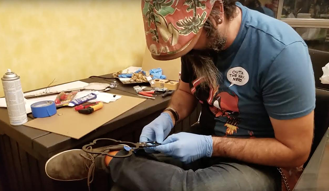 CANopener Labs founder Dale Bracey works on a project. - COURTESY PHOTO / CANOPENER LABS