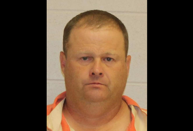 Benjamin Cook, 45, has been MacArthur's football coach since 2011. - BROWN COUNTY SHERIFF'S OFFICE