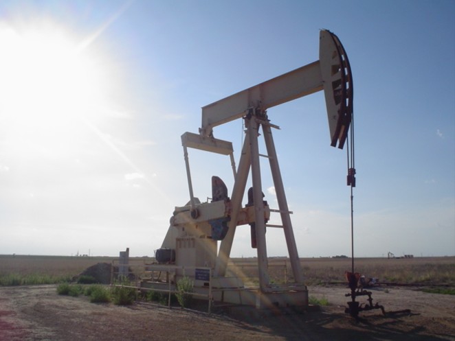 A pump jack operates in rural Texas. - WIKIMEDIA COMMONS / FLCELLOGUY