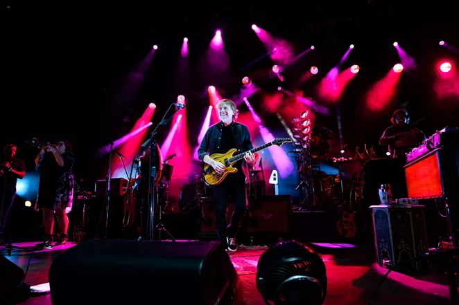 Anastasio shows a smile during Wednesday's Tobin Center performance. - JOHN DAVID SCARCLIFF