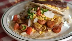 Taco Loco #2 is a collection of wieners, papas, beans, cheese and pico at Maria’s Cafe.