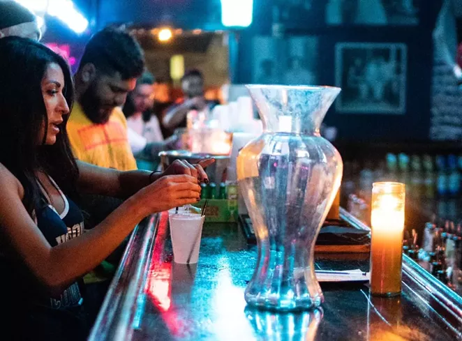 Patrons belly up at San Antonio's Squeezebox before the pandemic hit. - COURTESY PHOTO / CECIL RODARTE AND ADOLF ACOSTA