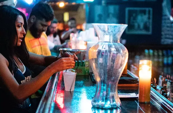 Patrons belly up at San Antonio's Squeezebox before the pandemic hit. - COURTESY PHOTO / CECIL RODARTE AND ADOLF ACOSTA
