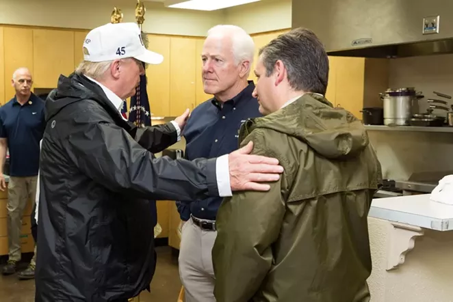 Donald Trump clasps the shoulders of his Texas BFFs. - THE WHITE HOUSE
