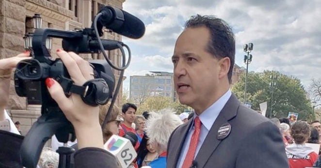Texas Sen. Jose Menendez speaks to TV news crews outside the state capitol. - TWITTER / JOSE MENENDEZ