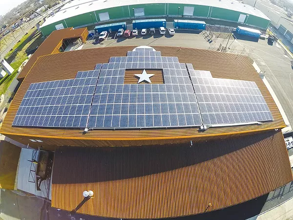 Solar panels lined up on the roof of Alamo Brewing Company. - COURTESY