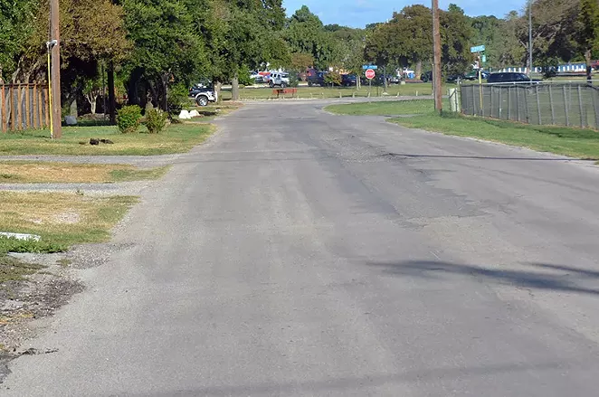 The lack of functional sidewalk encourages people to use cars more often. - MICHAEL MARKS