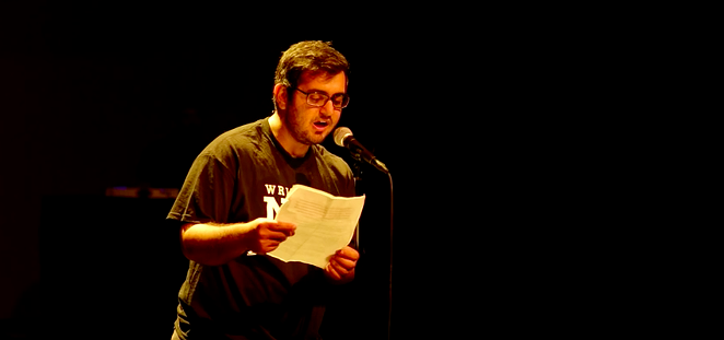 Amir Safi performing 'An Ode to Whataburger.' - YOUTUBE SCREENSHOT