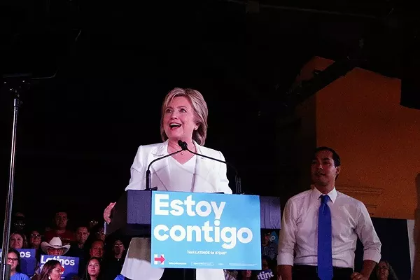 Hillary Clinton speaks as Julian Castro looks on at a rally on Thursday at Sunset Station. - GABBY MATA