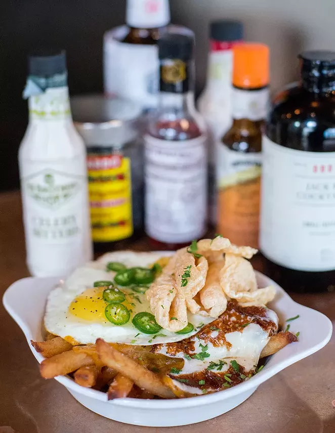 Old Main's chicharrón fries. - DAVID RANGEL