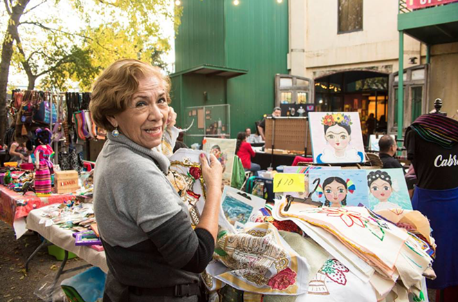 A vendor at a past edition of the Esperanza Center's Mercado de Paz. - COURTESY OF ESPERANZA PEACE AND JUSTICE CENTER