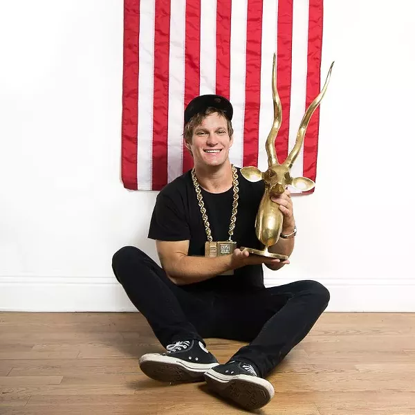 Lars and his trophy. - NICOLE MAGO