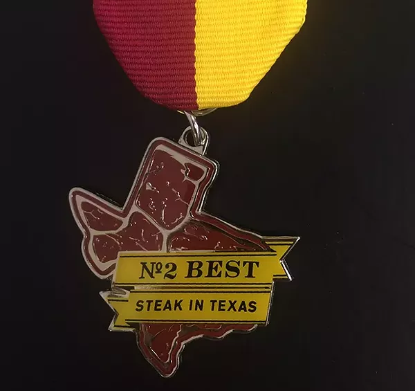 The 2016 medal will be unveiled next Tuesday. The 2015 medal is shown above.
