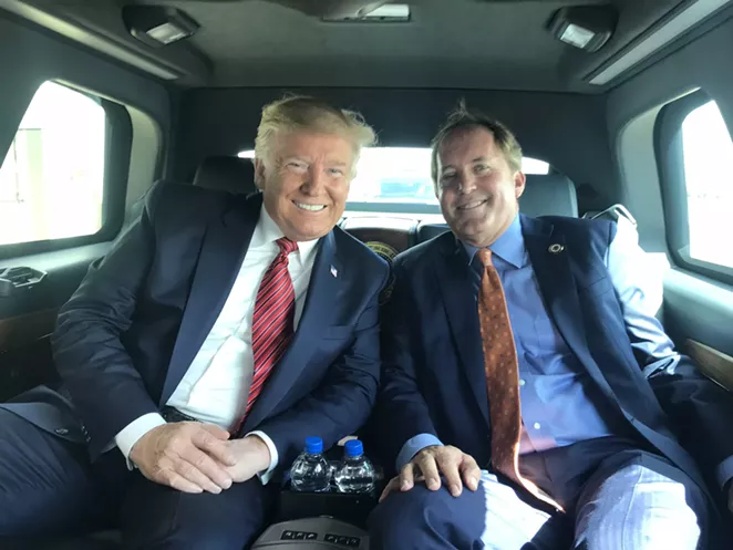 Ken Paxton, shown here with Donald Trump, has masterfully used distraction techniques similar to those of the president. - TWITTER / @KENPAXTONTX