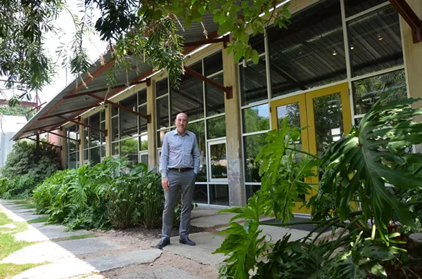 Irby Hightower, founding principal at Alamo Architects, stands outside of the firm's Southtown headquarters. - MARK REAGAN | SAN ANTONIO CURRENT