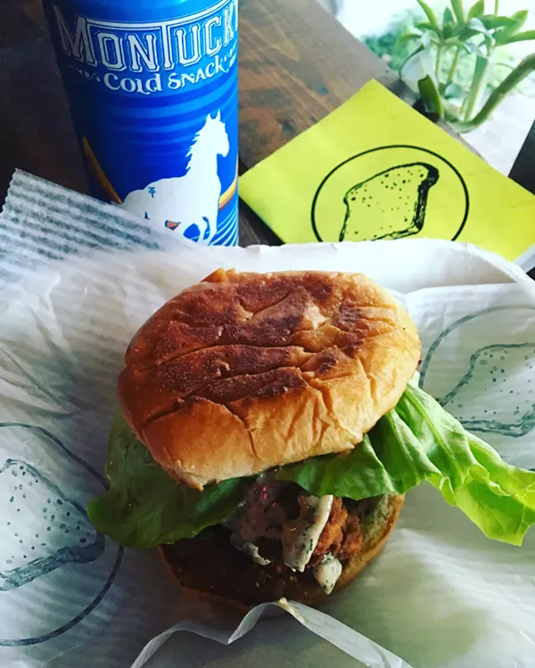 Curried fried chicken sandwich. - JESSICA ELIZARRARAS