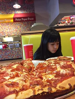 No, really, she loves pizza. - COURTESY