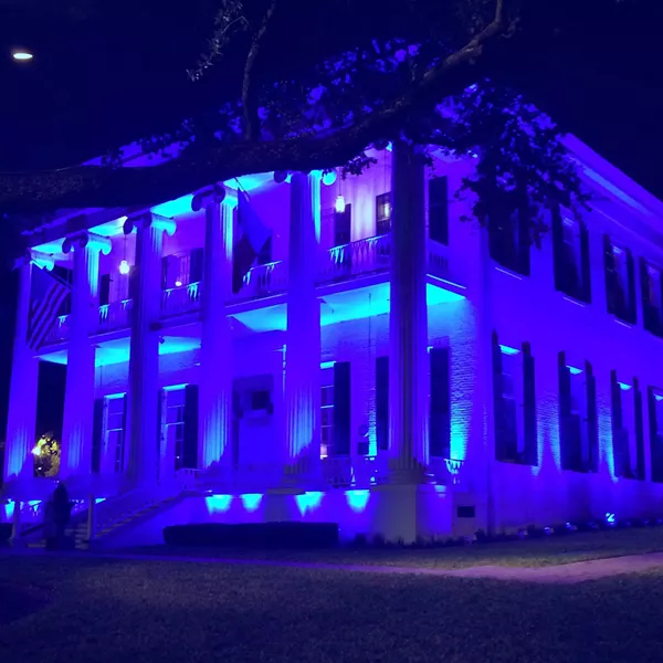 Blue lights illuminated the Texas Governor's Mansion earlier this month in remembrance of five Dallas police officers killed by a shooter who targeted law enforcement. - GOVERNOR GREG ABBOTT | FACEBOOK
