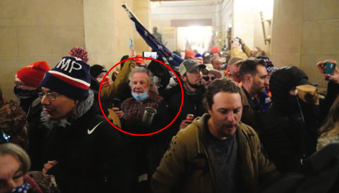 This photograph the FBI obtained from CNN appears to show James "Sonny" Uptmore inside the U.S. Capitol on January 6. He is circled in the image. - FBI