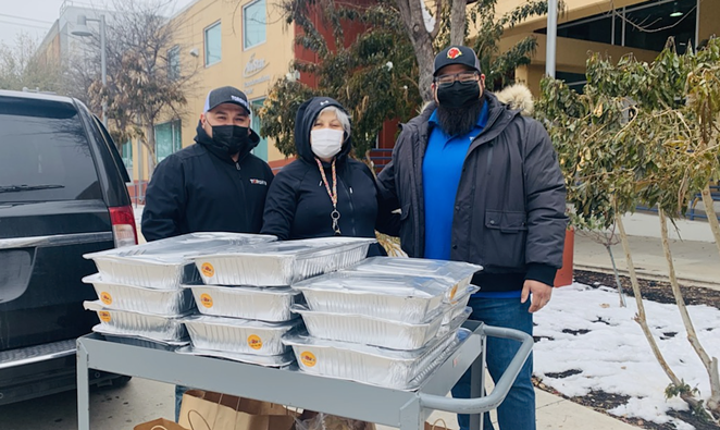 Torchy’s Tacos Medical Center location Managing Partner Joe Joyer rallied with staff to deliver 400 tacos to the Haven for Hope staff. - COURTESY TORCHY'S TACOS