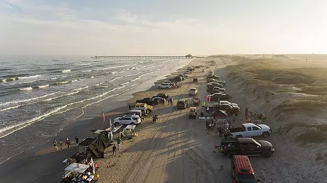 People park on the beach in South Padre Island, pre-COVID. - WIKIMEDIA COMMONS / MATTHEW T. RADER