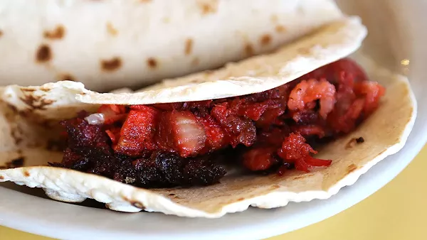The chicharron prensado taco at La Capital del Sabor. - BEN OLIVO