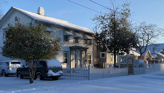 Snow blankets a neighborhood north of downtown San Antonio. - SANFORD NOWLIN