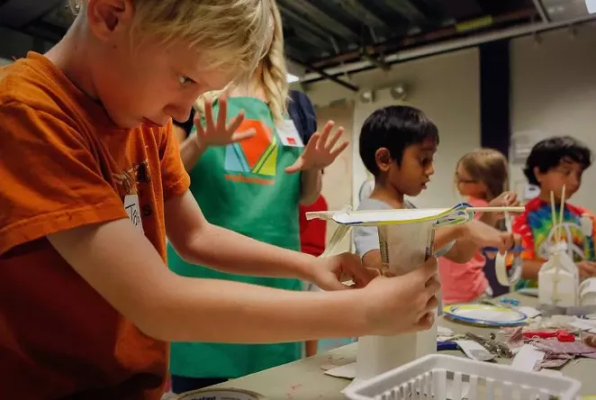 James Miller, 9, finishes his kinetic energy project during Secret Scientists summer camp at the Austin Children's Museum. The COVID-19 tests will be voluntary for both staff and campers. - ERICH SCHLEGEL / THE TEXAS TRIBUNE
